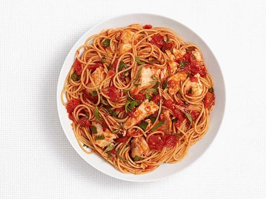 Fotografija špageta s tilapijom u začinjenom umaku od rajčice